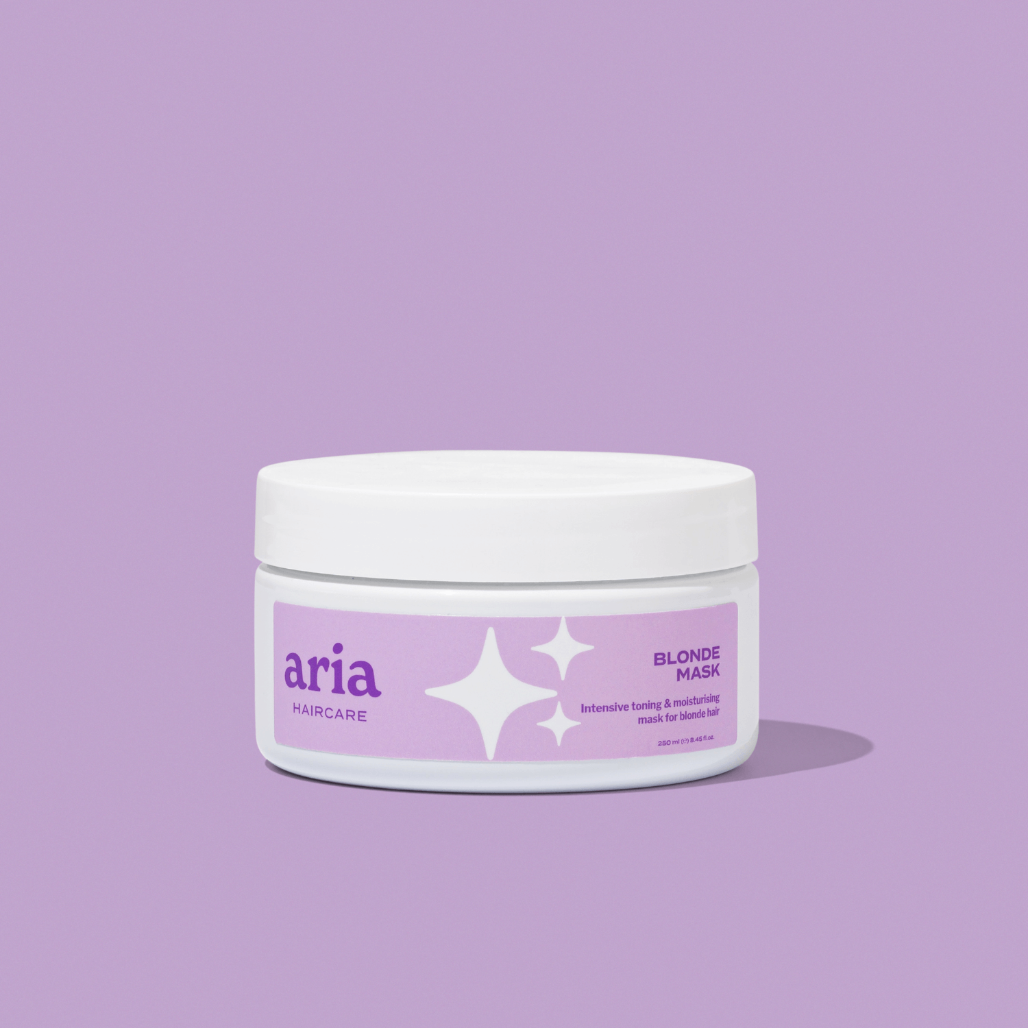 Aria haircare Blonde Mask on a purple background