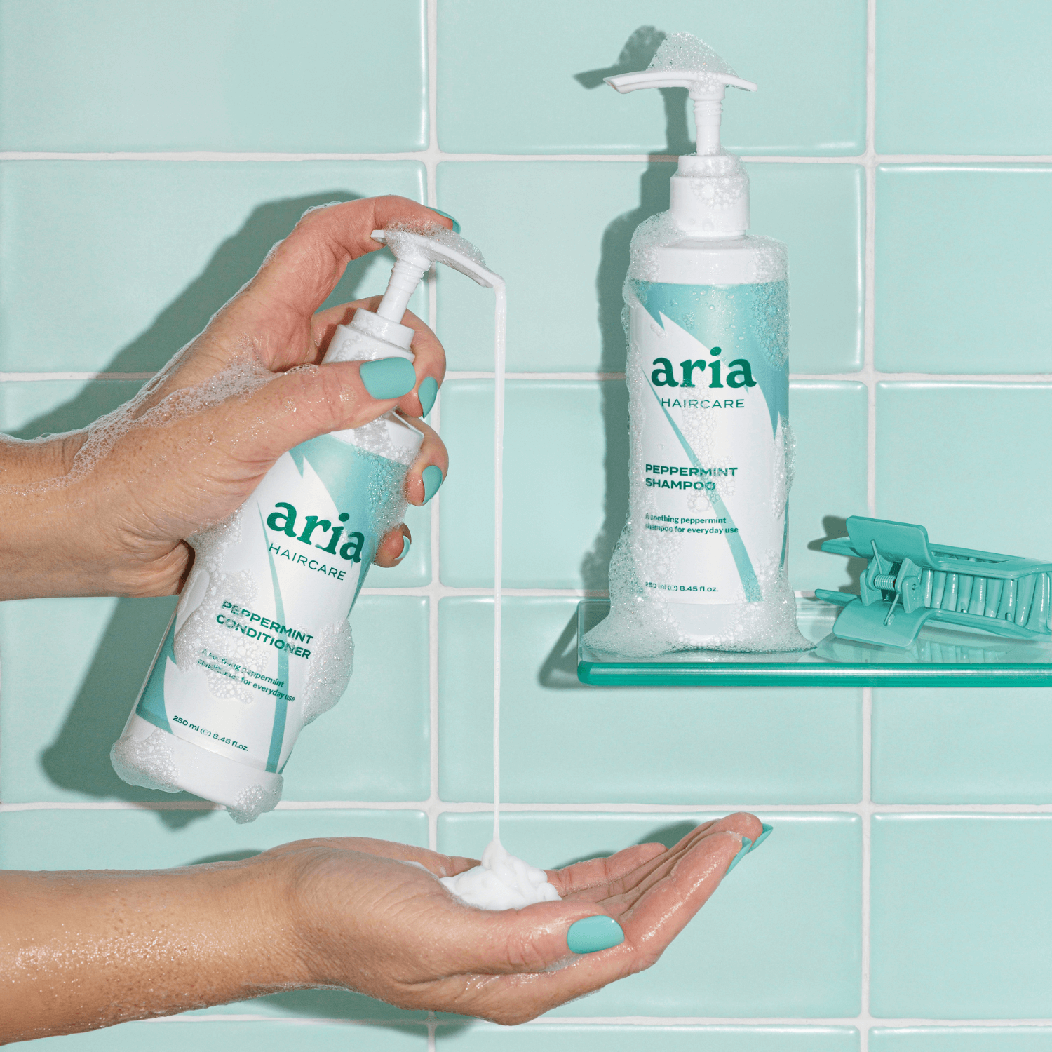 Aria Haircare Scalp Therapy peppermint shampoo and conditioner on tiled bathroom background